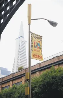  ?? Lea Suzuki / The Chronicle ?? A small-cell antenna enclosure is seen on top of a light pole in San Francisco. The devices boost wireless signals.