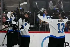  ?? Lucy Schaly/Post-Gazette ?? Toronto’s Allie Munroe skates over to celebrate with her teammates after they beat Montreal, 2-1, in a PWHL game on Sunday at PPG Paints Arena.