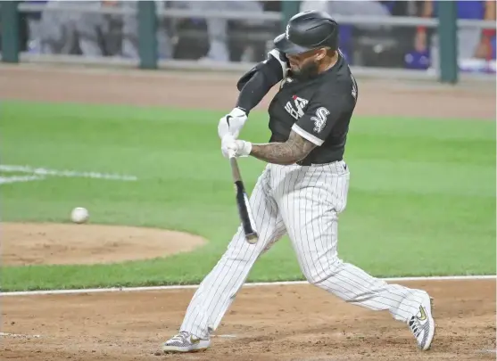  ?? GETTY IMAGES ?? Sox third baseman Yoan Moncada went 1-for-3 in an exhibition game Monday against the Cubs. He missed most of summer camp after testing positive for the coronaviru­s.