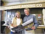  ?? STAFF PHOTO BY MATT HAMILTON ?? Co-owners Amy Clinton and Brent Songer work together at Tennessee Awning Co.