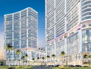  ?? ARTIST’S ILLUSTRATI­ON COURTESY OF BTI PARTNERS OF FORT LAUDERDALE ?? Two towers would rise on the east side of Young Circle in downtown Hollywood as part of a project planned by BTI Partners of Fort Lauderdale.