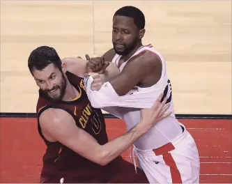  ?? STEVE RUSSELL
TORONTO STAR ?? Tangling up an offensive player, like Toronto guard C.J. Miles does to Cleveland centre Kevin Love in this scene from last season’s playoffs, is a whole lot harder now, thanks to an NBA-wide crackdown.
