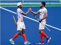  ?? AP ?? Mandeep Singh (left) put India ahead in the 45th minute. —