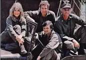  ?? KEYSTONE – GETTY IMAGES ?? Alan Alda, foreground, with original “M*A*S*H” cast members Loretta Swit, Wayne Rogers and McLean Stevenson.