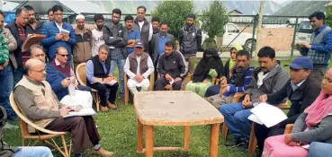  ??  ?? SYLVAN DEAL Chief secretary B.V.R. Subrahmany­am (in khaki jacket) at a ‘Back to Village’ programme in Gurez, Jun. 24