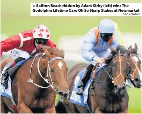  ?? Alan Crowhust ?? > Saffron Beach ridden by Adam Kirby (left) wins The Godolphin Lifetime Care Oh So Sharp Stakes at Newmarket