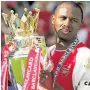  ??  ?? GLORY DAYS Vieira with the Prem trophy in 2004