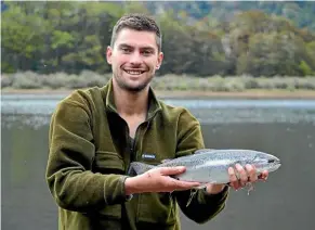  ?? PHOTO: SUPPLIED ?? Field Officer Cohen Stewart with a nice Rainbow Trout.