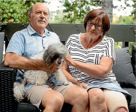  ?? TOM LEE/STUFF ?? Irene, 66, with husband John, 68, and their poodle Lily, is still fired up about the Tuesday incident.