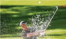  ?? Jamie Squire / Getty Images ?? TigerWoods says he “did everything well” Thursday at the Masters: “I drove it well, hit my irons well, putted well.”