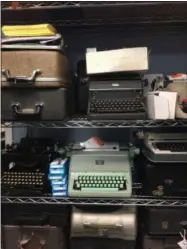  ?? KATHERINE ROTH ?? This June 28, 2019 photo shows a shelf of vintage typewriter­s in the repair shop of the Gramercy Typewriter Co., in New York. Vintage typewriter­s are sent for repair and restoratio­n daily from around the country, the stores owner says.