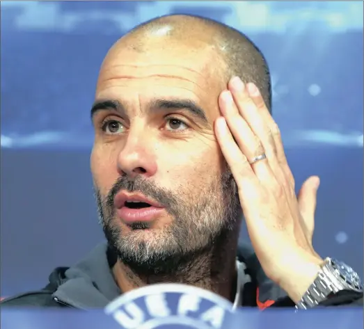  ?? PICTURE: REUTERS ?? PLENTY TO THINK ABOUT: Bayern Munich coach Pep Guardiola needs to come up with a plan to get past high-flying Barcelona tonight.