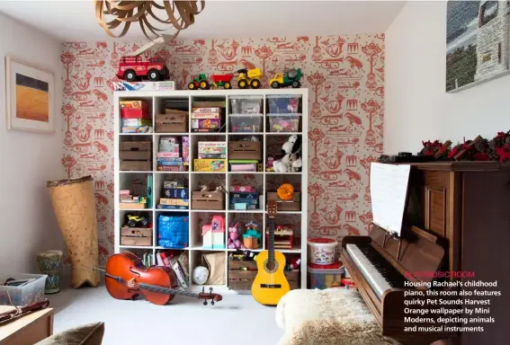  ??  ?? PLAY/MUSIC ROOM
Housing Rachael’s childhood piano, this room also features quirky Pet Sounds Harvest Orange wallpaper by Mini Moderns, depicting animals and musical instrument­s