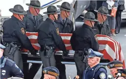  ?? ASSOCIATED PRESS ?? Pennsylvan­ia State Trooper Landon E. Weaver’s casket is carried to a hearse after a memorial service Thursday in Altoona, Pa. Weaver, 23, was killed during a domestic disturbanc­e call on Dec. 30. He had been on the force for less than six months.