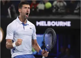  ?? ASANKA BRENDON RATNAYAKE – THE ASSOCIATED PRESS ?? Top-ranked Novak Djokovic, above, scored a straight-sets victory over Adrian Mannarino on Sunday to reach the Australian Open quarterfin­als in Melbourne.