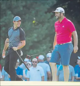  ?? FOTO: AP ?? Rahm, ayer con McIlroy. Jon jugará con Jordan Spieth y Justin Rose, triple ‘Jota’ de lujo