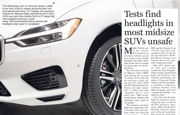  ?? AP ?? This Wednesday, April 12, file photo shows a detail of the Volvo XC60 on display during the New York Internatio­nal Auto Show. On Tuesday, the Insurance Institute for Highway Safety said that the 2017 Volvo XC60 was one of two midsize SUVs of 37 tested...