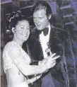  ??  ?? Joan Waters with Roger Moore.