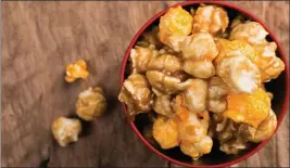  ?? PHOTOS BY SHUTTERSTO­CK ?? Christmas movie watching is incomplete without hot caramel popcorn for snacking.