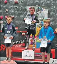  ??  ?? Archie on top of the podium at the Aberdeen stage of the Youth Climbing Series.