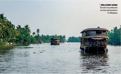  ??  ?? WELCOME SIGNS
Tourist houseboats on the backwaters in Alleppey