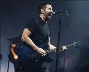  ?? PHOTO COURTESY OF KEN SETTLE ?? Nine Inch Nails’ Trent Reznor performs on Oct. 22, 2018, during the first of two shows at Detroit’s Fox Theatre.