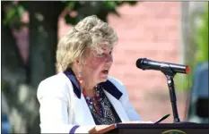  ?? CAMERON MORSBERGER — LOWELL SUN ?? Lowell City Councilor Rita Mercier speaks during a
Memorial Day ceremony at Centralvil­le Memorial Park in Lowell, May 29, 2023. Mercier shared a prayer and thanked veterans for affording citizens their freedoms.