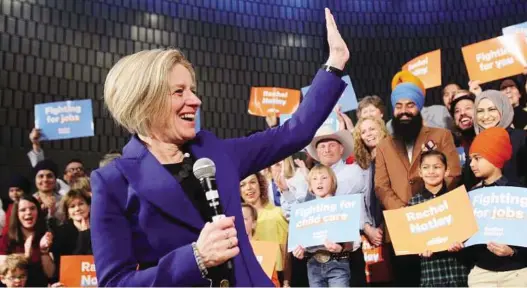  ?? DAVE CHIDLEY / THE CANADIAN PRESS ?? Alberta Premier Rachel Notley addresses a crowd in Calgary on Tuesday. Her New Democratic Party is fighting to regain power in a province where the economy has struggled.