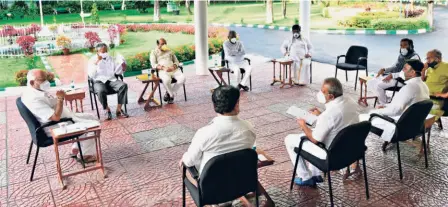  ??  ?? CHIEF MINISTER B.S. YEDIYURAPP­A holding a meeting with Cabinet Ministers on COVID issues at his residence in Bengaluru on July 20.