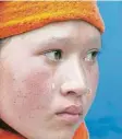  ?? Foto: Prabin Ranabhat/SO‰ PA Images via ZUMA Wire/dpa ?? Wenn wir weinen, kullern uns Tränen die Wangen hinunter – wie bei diesem Mäd‰ chen aus Nepal.