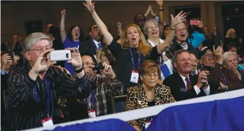  ??  ?? PEOPLE CHEER as US President Donald Trump addresses the Conservati­ve Political Action Conference (CPAC) in Oxon Hill, Maryland, last Friday.