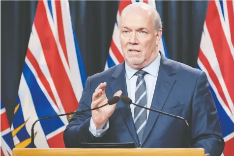  ?? DON CRAIG/B.C. GOVERNMENT ?? Premier John Horgan said on Tuesday that he cannot guarantee every community in B.C. will have a mass-vaccinatio­n clinic, but every person eligible for a shot in Phase 2 will have access in their community.