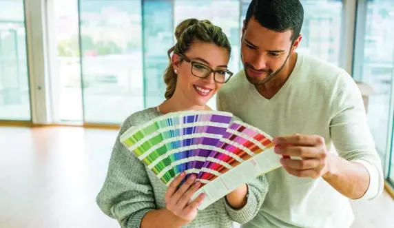  ?? Metro creative services ?? CHOICES, CHOICES: Choose a standout color from existing furnishing­s, such as the dominant color from a patterned decorative pillow or piece of furniture, and then look for the same shade to paint the walls.