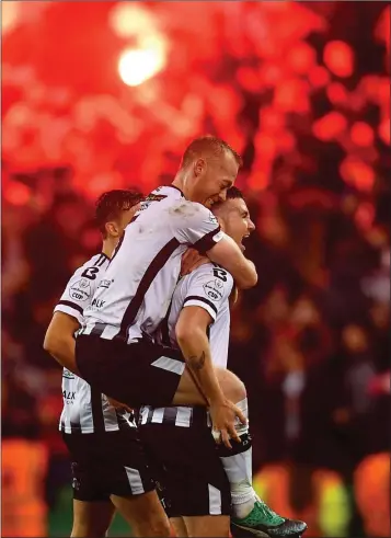  ??  ?? Patrick McEleney (right) and Chris Shields of Dundalk celebrate at the final whistle.