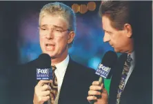  ?? Michael Macor / The Chronicle 1998 ?? Giants announcers Mike Krukow (left) and Duane Kuiper, shown in 1998, first started broadcasti­ng together in 1990.
Top: Kuiper (left) and Krukow get ready for a socially distanced broadcast from Oracle Park on Sept. 9.