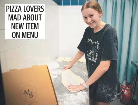  ?? ?? Sarah Jacobs, 16, is a baker's assistant at The Mad Baker, Mission Beach, which has added pizzas to its menu. Picture: Arun Singh Mann