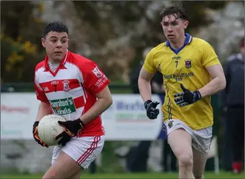  ??  ?? Adam Baziz of St. Mary’s (Maudlintow­n) has time on his side as Michael Cullen (GOH) looks on.