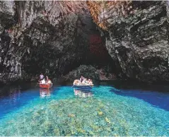  ??  ?? Above: the blue waters of Melissani Lake Right: the Monastery of Agios Gerasimos