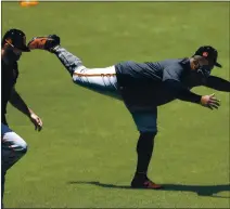  ?? PHOTOS BY NHAT V. MEYER — STAFF PHOTOGRAPH­ER ?? Pablo Sandoval, preparing for his 11th season with the Giants, takes part in drills during training camp at Oracle Park on Sunday.