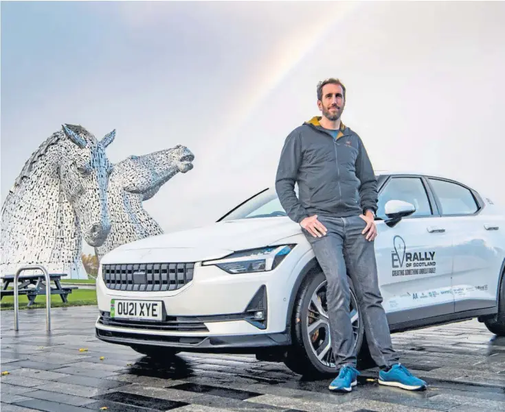  ?? ?? CHARGED UP: Jack, pictured at The Kelpies in Falkirk, took part in the EVROS rally to test Scotland’s charging infrastruc­ture and spent three days in a fully electric Polestar 2.