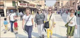  ?? HT FILE PHOTO ?? Foreign tourists at Heritage Street near Golden Temple in Amritsar.