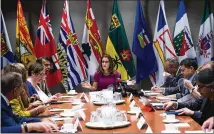  ?? NATHAN DENETTE / THE CANADIAN PRESS ?? Canadian Foreign Affairs Minister Chrystia Freeland (center) holds a roundtable consultati­on Tuesday in Toronto about NAFTA with labor stakeholde­rs. Talks on overhaulin­g the 23-year-old trade deal begin today in Washington, D.C.
