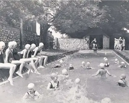  ??  ?? Girls swimming at Badminton School’s pool in the 1930s – the pool was a former sheep dip trough; Below left, Badminton School pictured last year