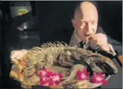  ?? EMILY V. DRISCOLL/BONSCI FILMS ?? ▪ Amazon CEO Jeff Bezos eating roasted iguana at the Explorers Club Annual Dinner in New York