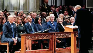  ?? [AP PHOTO] ?? From left, President Donald Trump, first lady Melania Trump, former President Barack Obama, Michelle Obama, former President Bill Clinton, former Secretary of State Hillary Clinton, and former President Jimmy Carter listen as former Sen. Alan Simpson, R-Wyo., speaks during a state funeral at the National Cathedral on Wednesday in Washington, for former President George H.W. Bush. In the second row are Vice President Mike Pence and Karen Pence.