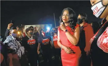  ?? LAURIE SKRIVAN AP ?? Delta Sigma Theta sorority sisters serenade and celebrate St. Louis Mayor-elect Tishaura Jones’ victory during her watch party Tuesday in St. Louis. Jones will take over as the city’s first Black female mayor.