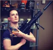  ??  ?? attacked: Luke Oakeshott poses with a weapon