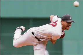  ?? Steven Senne / Associated Press ?? Boston Red Sox’s Nick Pivetta delivers a pitch against the St. Louis Cardinals in the first inning Sunday in Boston.