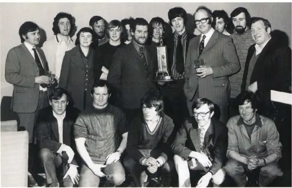 ??  ?? At the presentati­on of the 1975 Hennessy Cup to the winning Harp Lager team are, back, B. Wilson, P. McCarthy, A. Curry, O. Traynor, G. McManus, T. Moran (team manager), J. Callan, N. Connolly, J. Carson (managing director), P. Callaghan, M. Dunleavy,...
