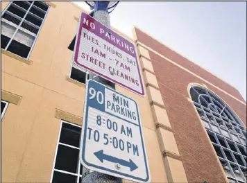  ?? JAMES MACPHERSON / ASSOCIATED PRESS ?? No Parking signs are displayed in downtown Bismarck, N.D. North Dakota is the only state that bans parking meters. Instead of using meters, many cities enforce parking limits by chalking vehicle tires.